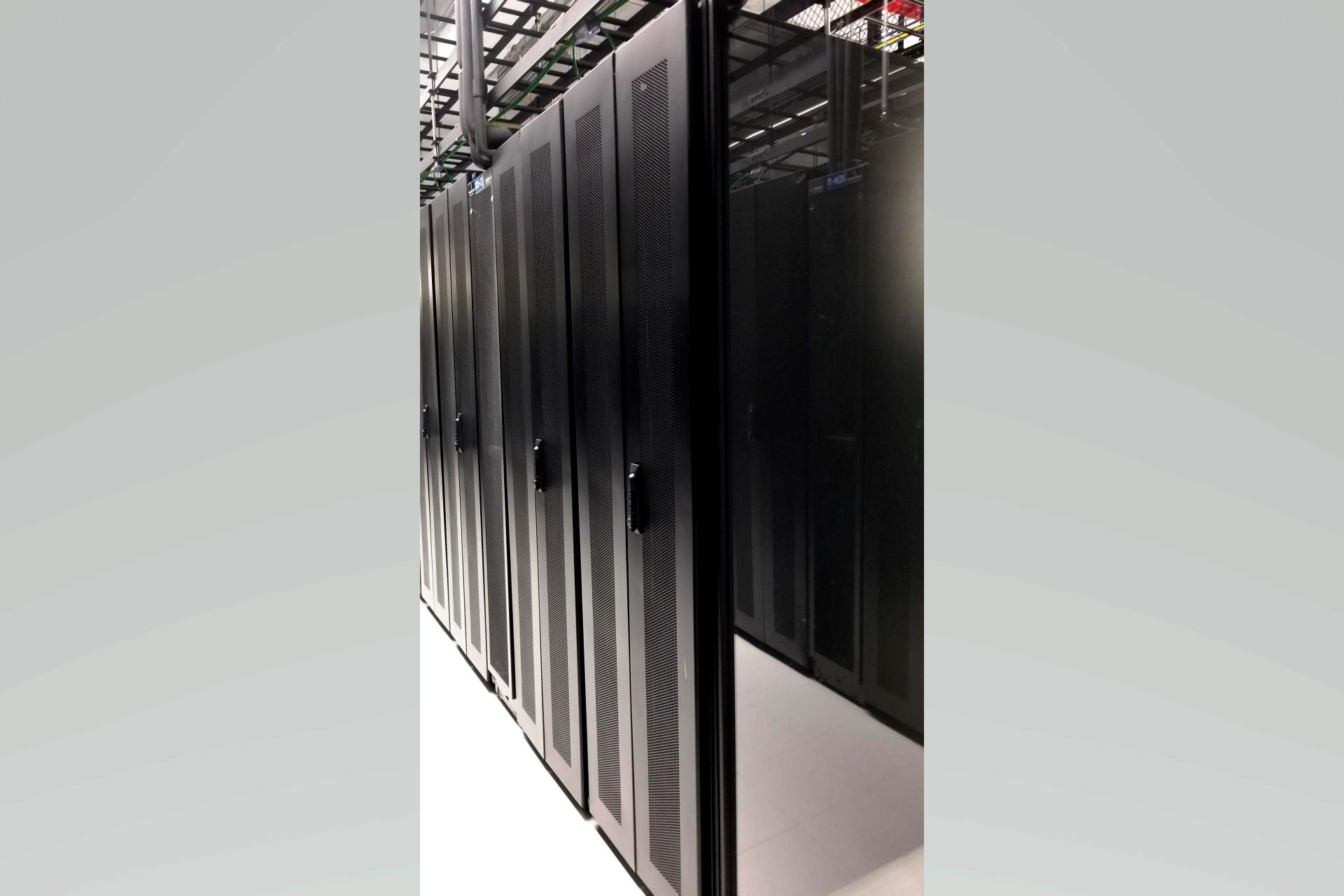 The MMR is fit out with hot/cold aisle configured rack rows as well as dedicated/caged 'client-suites.' 